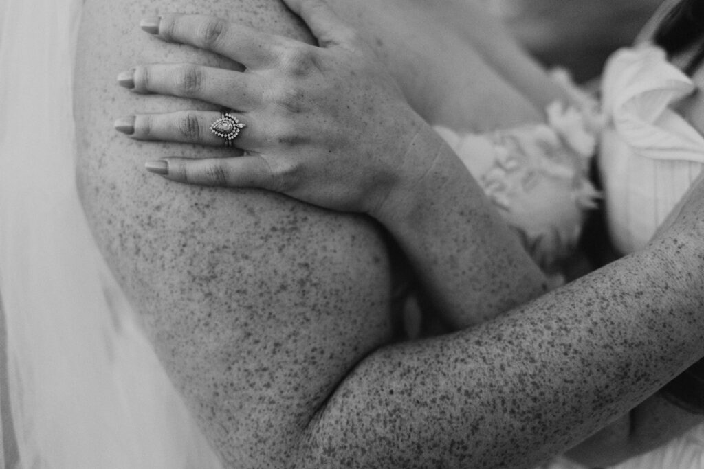Freckle and wedding ring photo at elopement