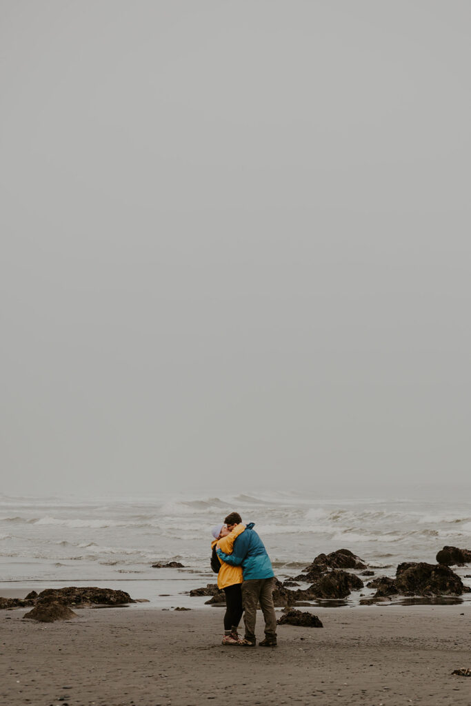 Couple tide pooling on the Washington Coast