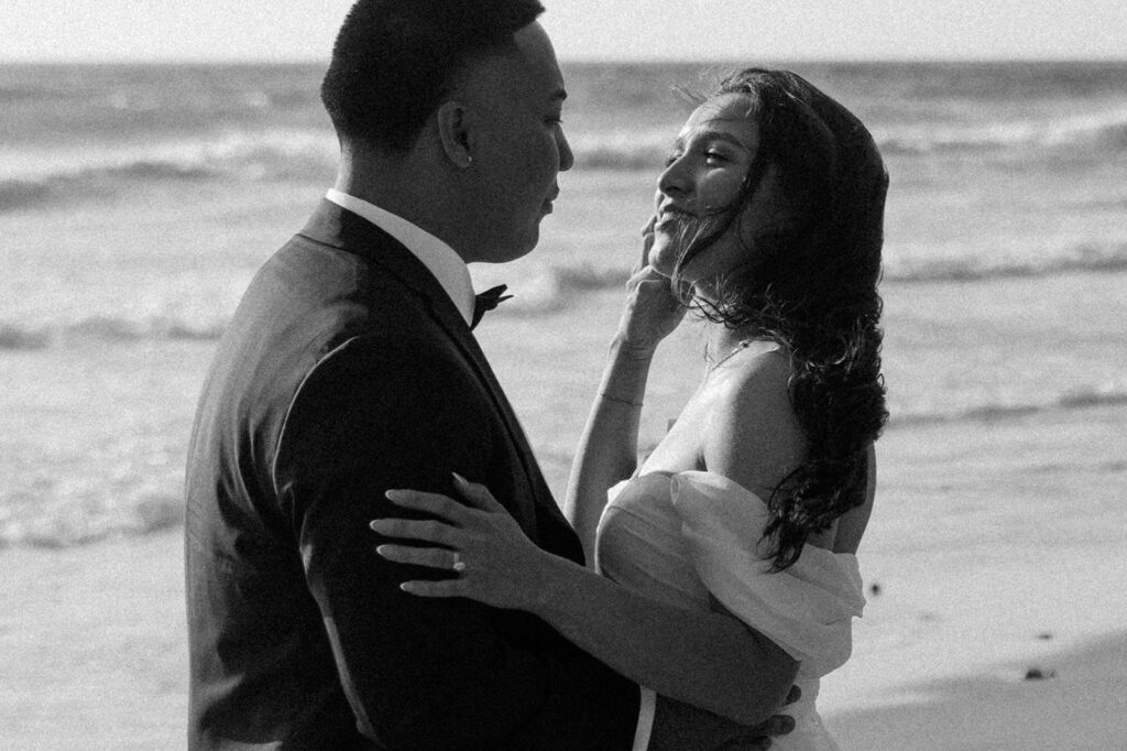 A couple during their elopement day on the Oregon Coast in black and white