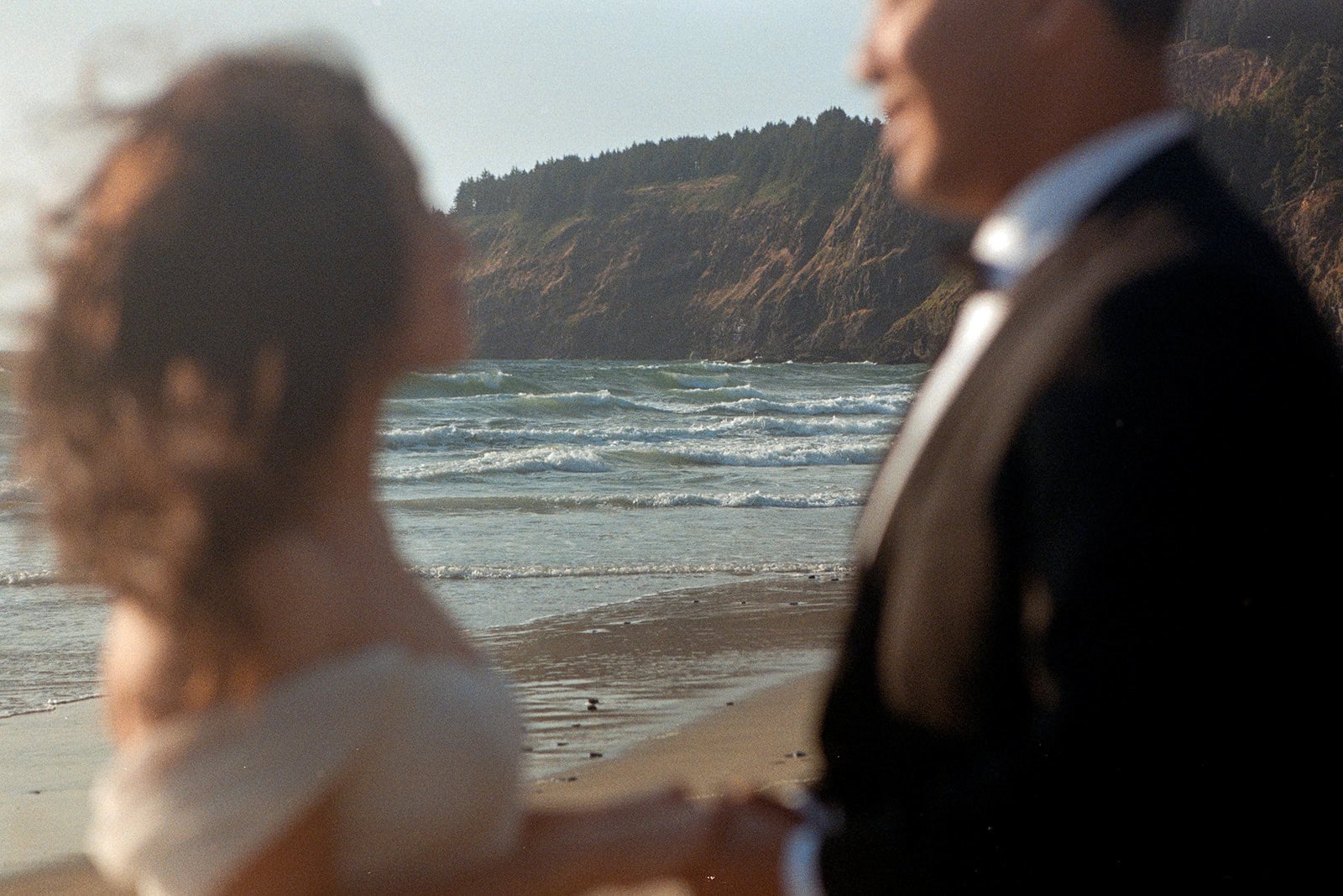 A couple during their elopement day on the Oregon Coast on 35mm film
