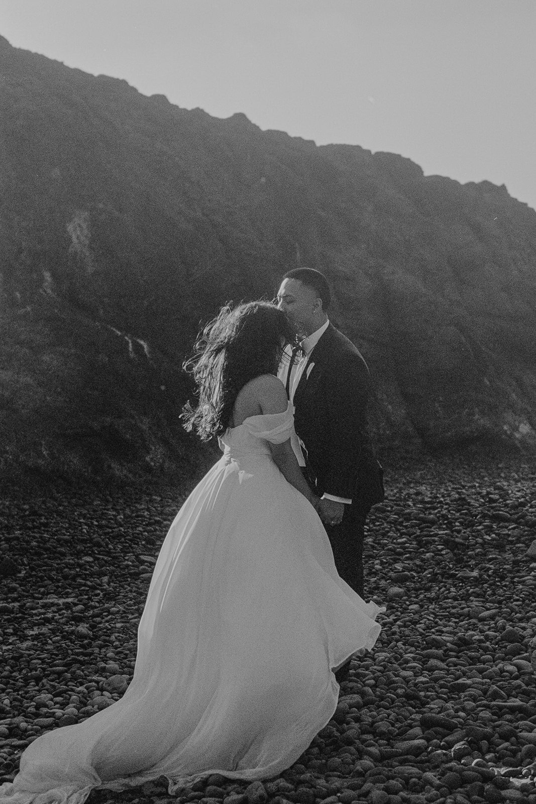 A couple during their elopement day on the Oregon Coast on 35mm film