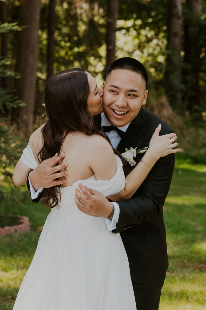 A bride and groom during their first look before their Oregon Coast elopement